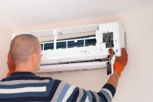 tech doing ac repairs